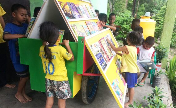 Mobile book carts help children in remote communities to read