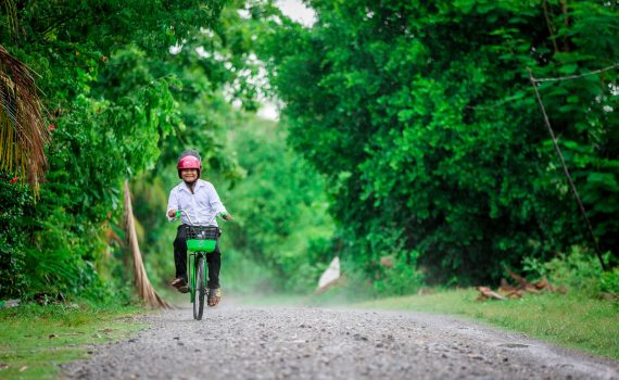 Prasak’s new bicycle helps him get to school safely